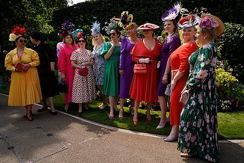 Racegoers pose for photo